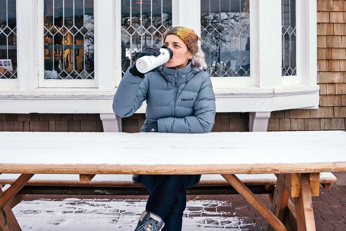 Outdoor clothing brands (Marmot Montreal Down Coat sitting at picnic table)